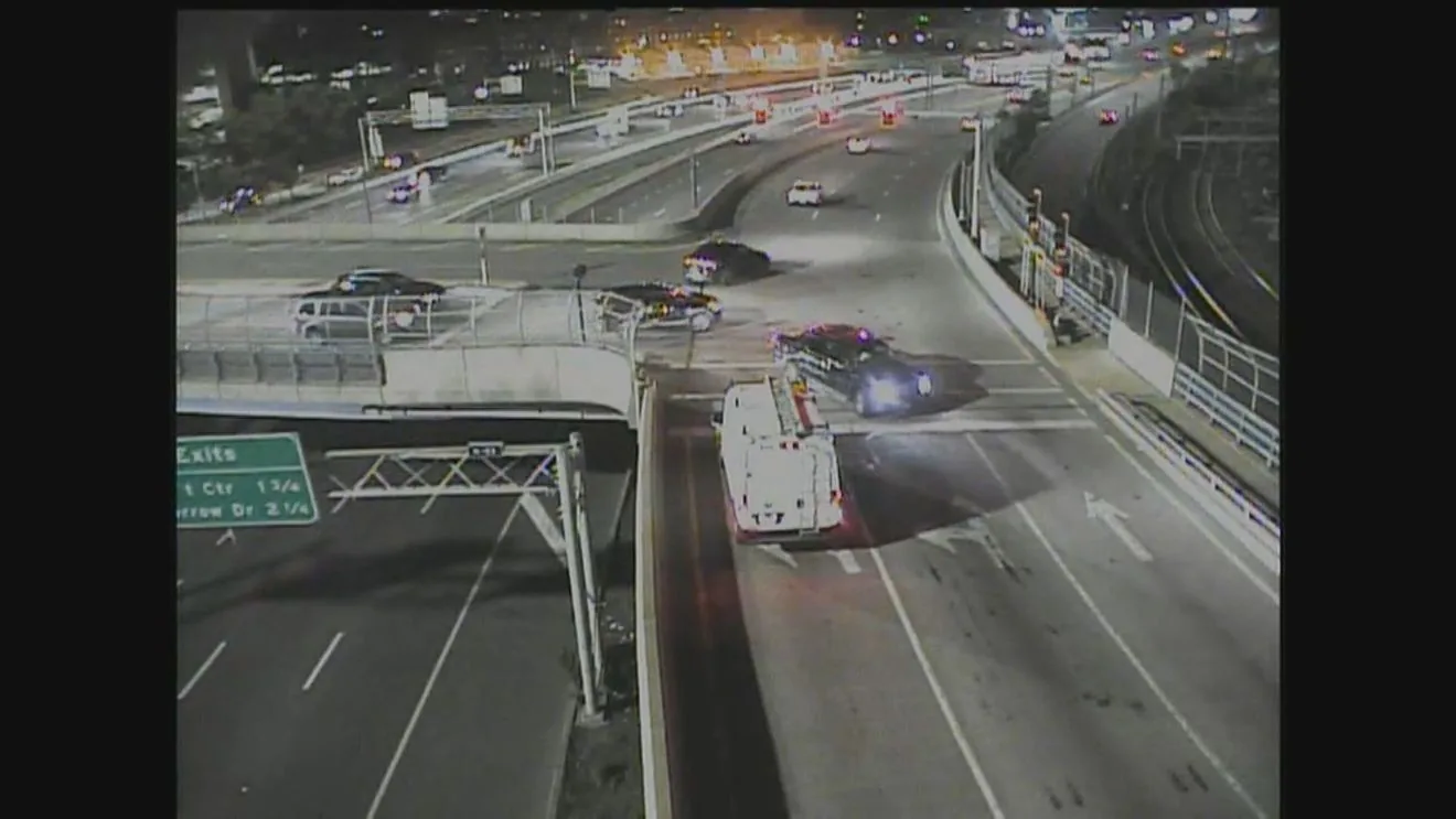 Police investigate a wrong-way crash scene on Interstate 93 in Boston