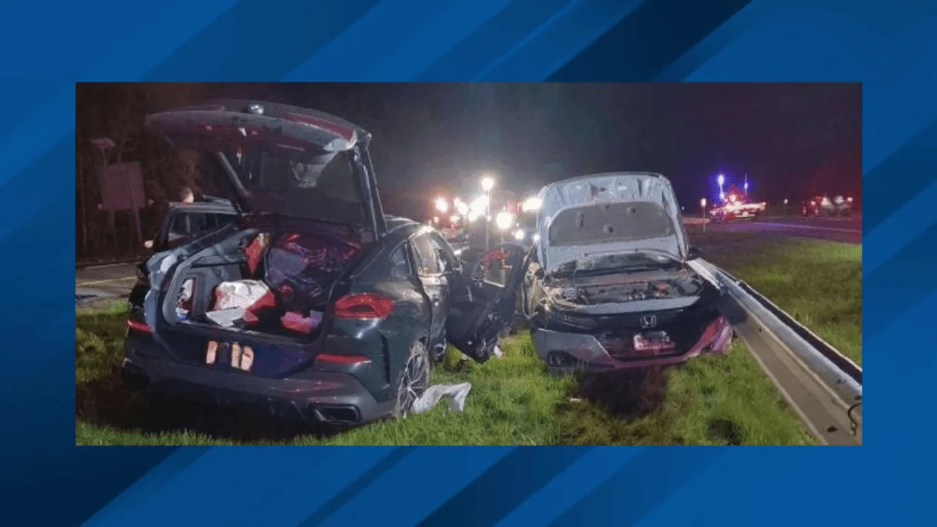 Police investigate a wrong-way crash scene on Interstate 87 in Ulster County, New York