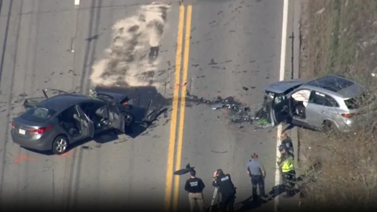 Damaged sedan and SUV at a crash scene on Route 20 in Shrewsbury, Massachusetts