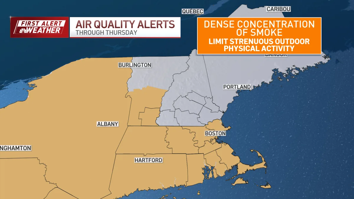 Hazy skyline conditions with smoke and storm clouds over Boston area