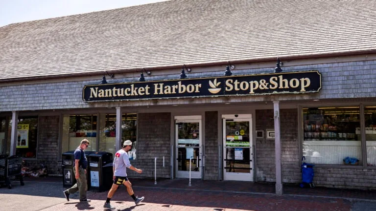 Police investigate a fatal crash scene in a Nantucket parking lot