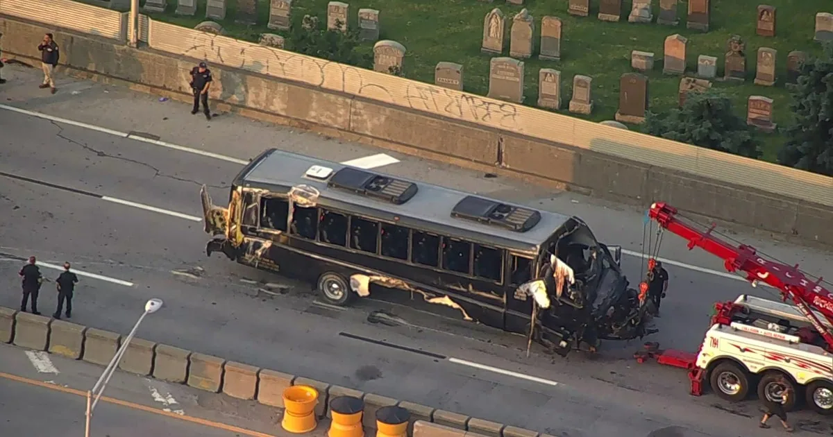 Police and emergency crews at a crash scene on the Long Island Expressway in Queens