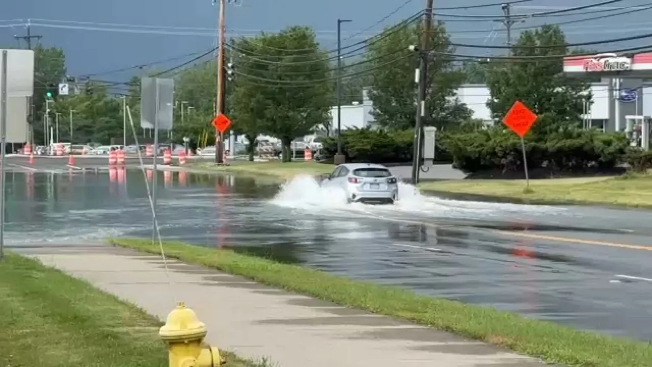 Floodwater covers a road in New York after heavy rain and severe storms
