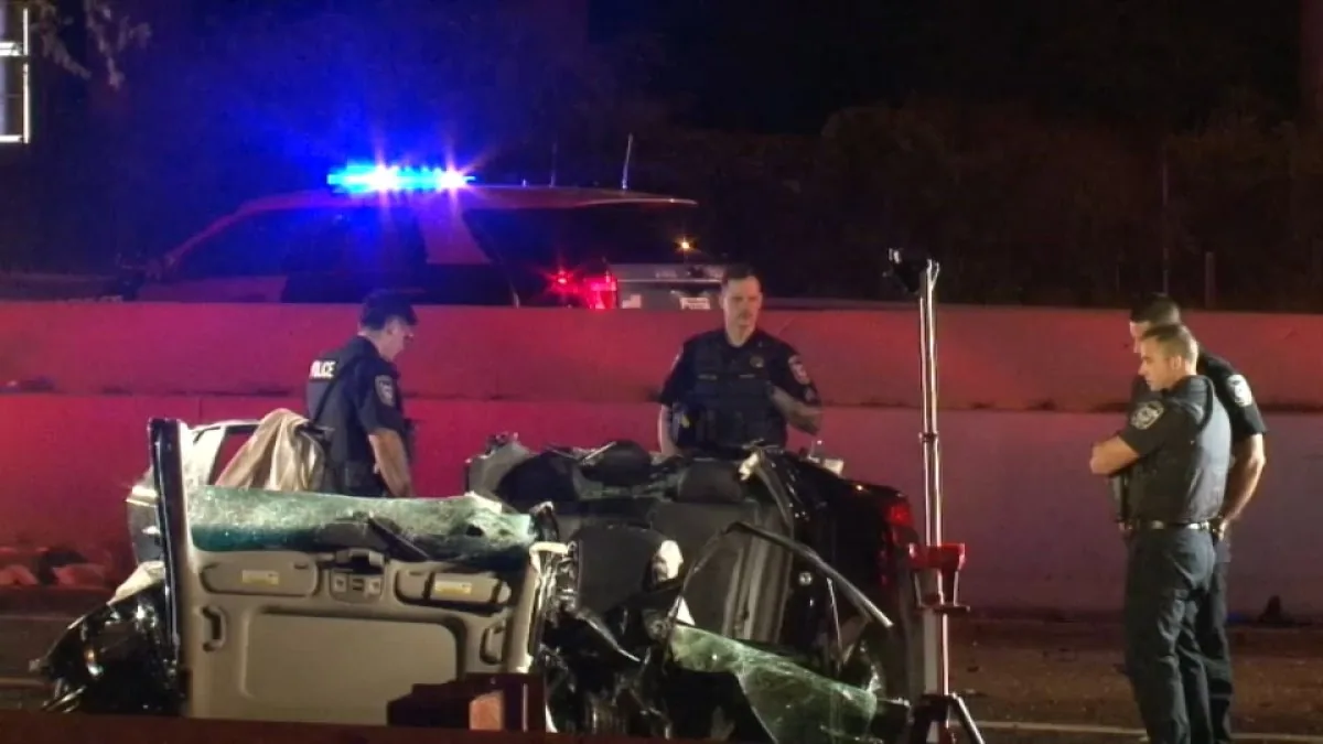 State police vehicles and emergency crews at a wrong-way crash scene on a highway in Millbury