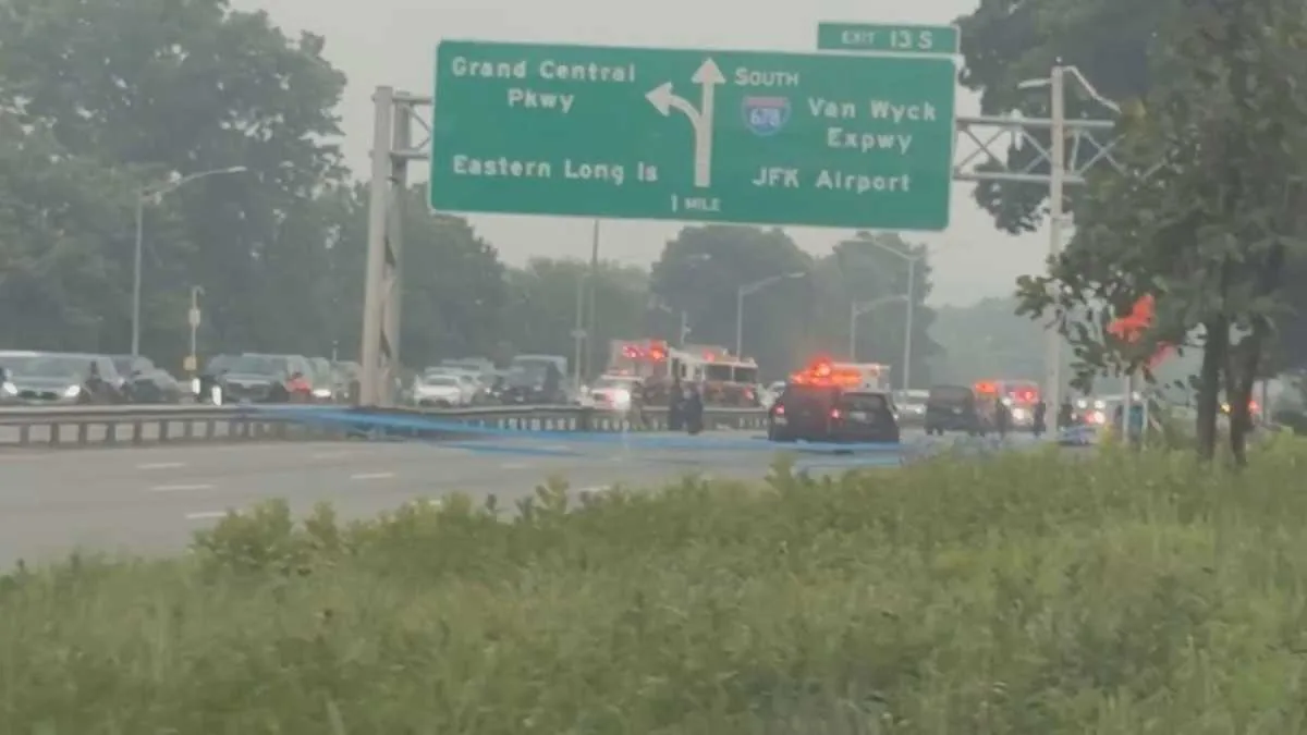 Police investigate a fatal motorcycle crash on the Grand Central Parkway in Briarwood
