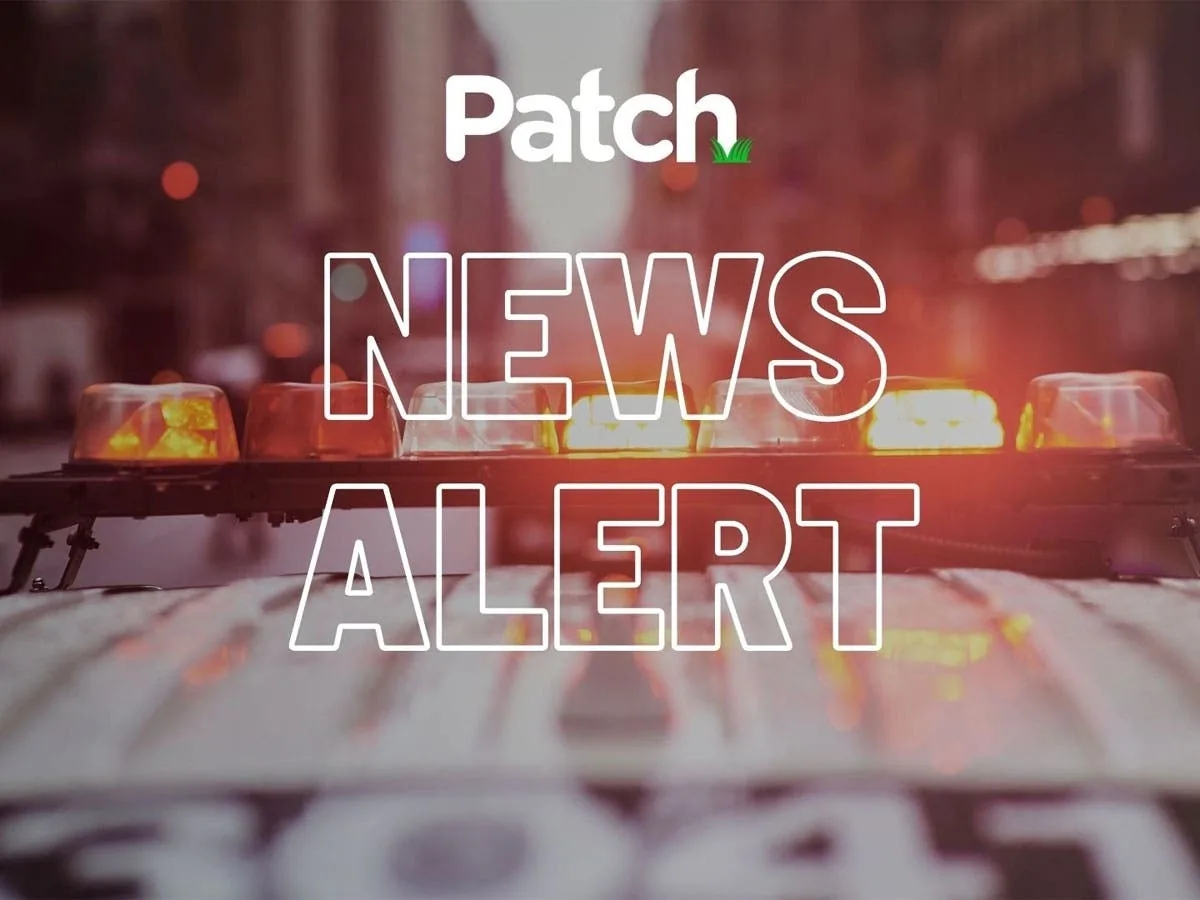 Police vehicles and traffic lanes near a fatal crash scene on I-95 in Milford, Connecticut