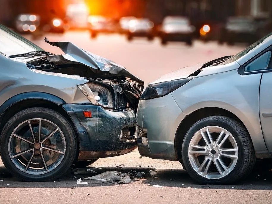 Police and emergency crews respond to a fatal head-on crash on Beacon Street in Newton