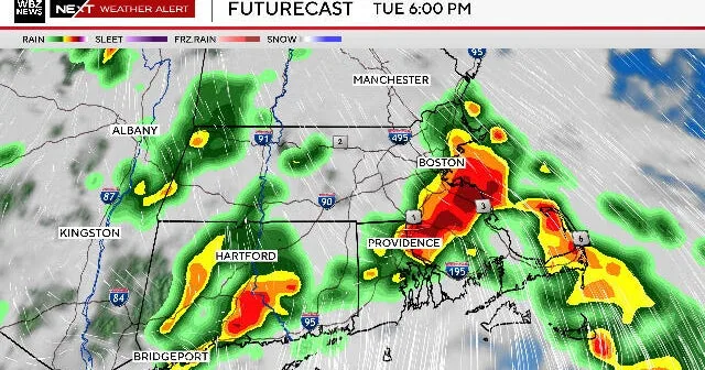 Dark storm clouds over the Boston skyline as forecasters warn of heavy rain and wind