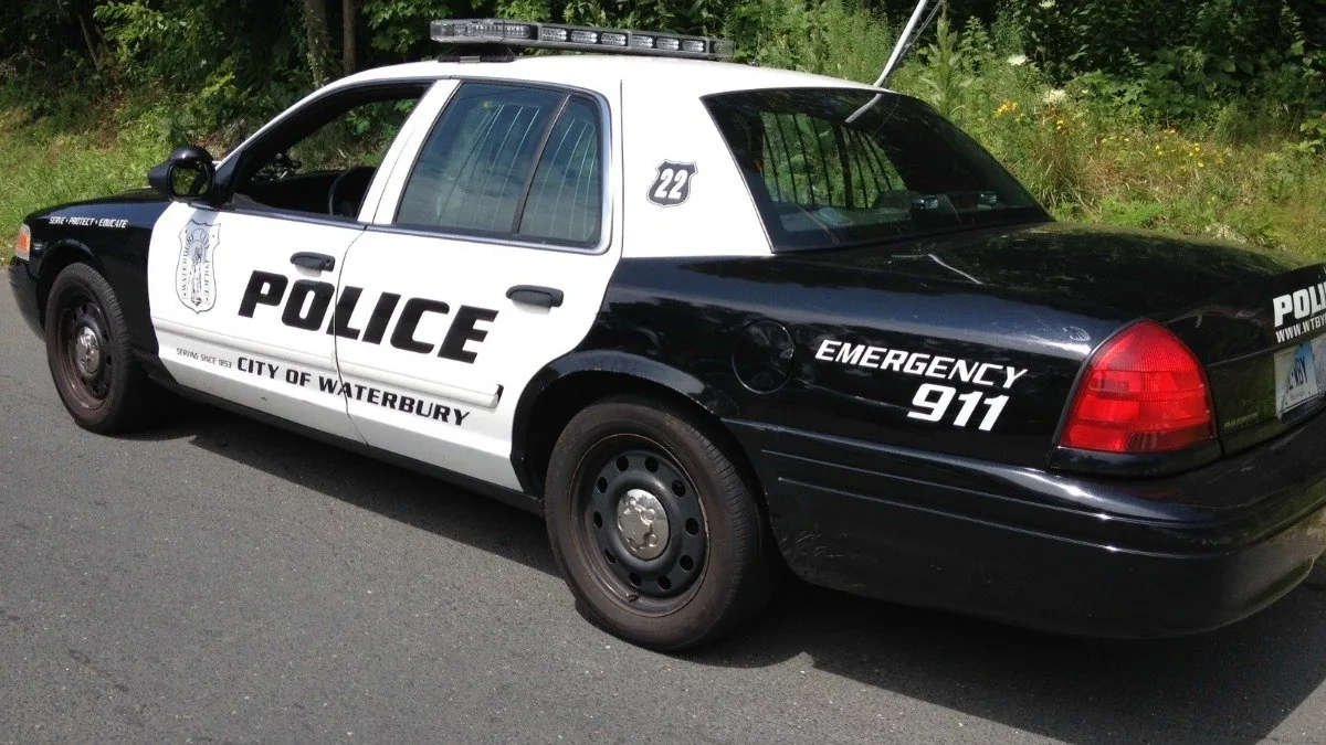 Police investigate a two-car crash on Chase Avenue in Waterbury after an early Sunday collision